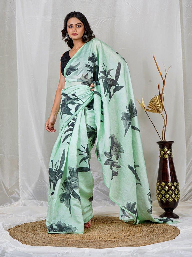 Symphony of Elegance and Grace – Pastel Green Chanderi Floral Saree