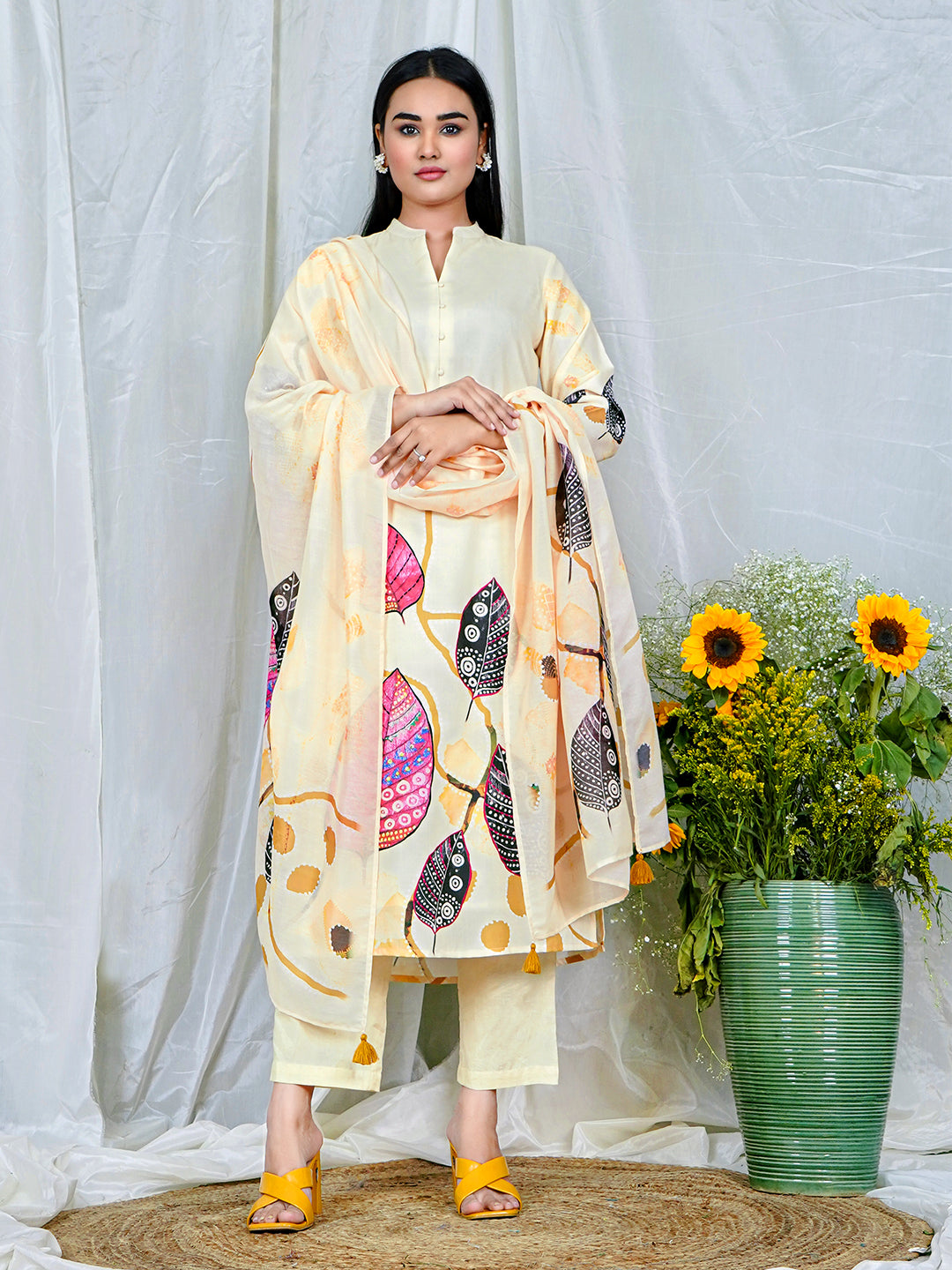 Cream Kurta Set with Vibrant Leaf Motifs & Golden Tassels